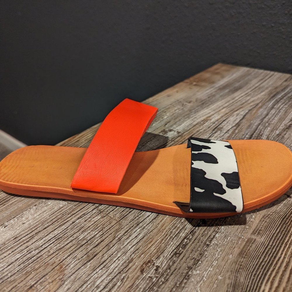 Neon coral and cowprint strap sandal